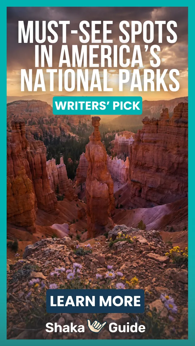 A vertical promotional graphic for Shaka Guide featuring a dramatic sunset view of Thor's Hammer, the iconic hoodoo formation in Bryce Canyon National Park, Utah. The towering orange and red rock spire rises above a canyon filled with hoodoos, with small wildflowers — purple asters and yellow blooms — in the rocky foreground and moody storm clouds glowing golden in the background. Bold text overlays read "Must-See Spots in America's National Parks — Writers' Pick — Learn More." The Shaka Guide logo appears at the bottom.
