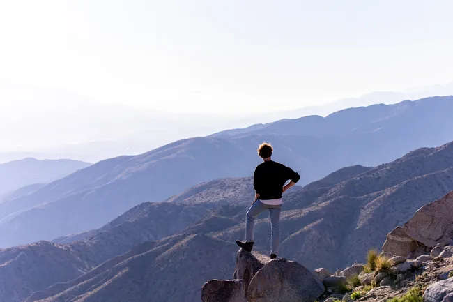 man standing at the overlook of keys view