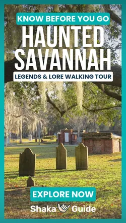 Gravestones in a cemetery under Spanish moss, suggesting a haunted theme for the Savannah Legends & Lore Walking Tour.
